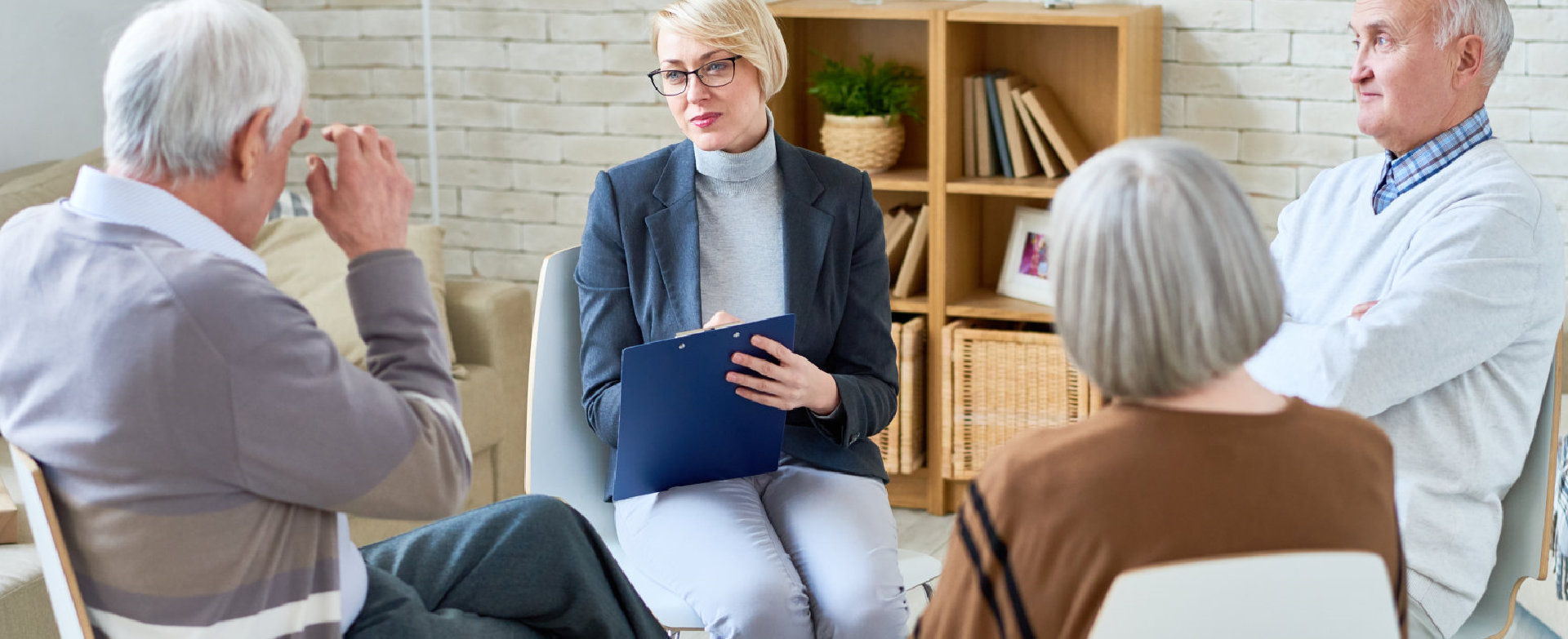 a lady counseling seniors